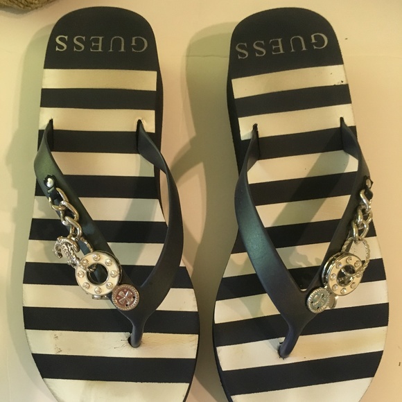 guess flip flops with charms